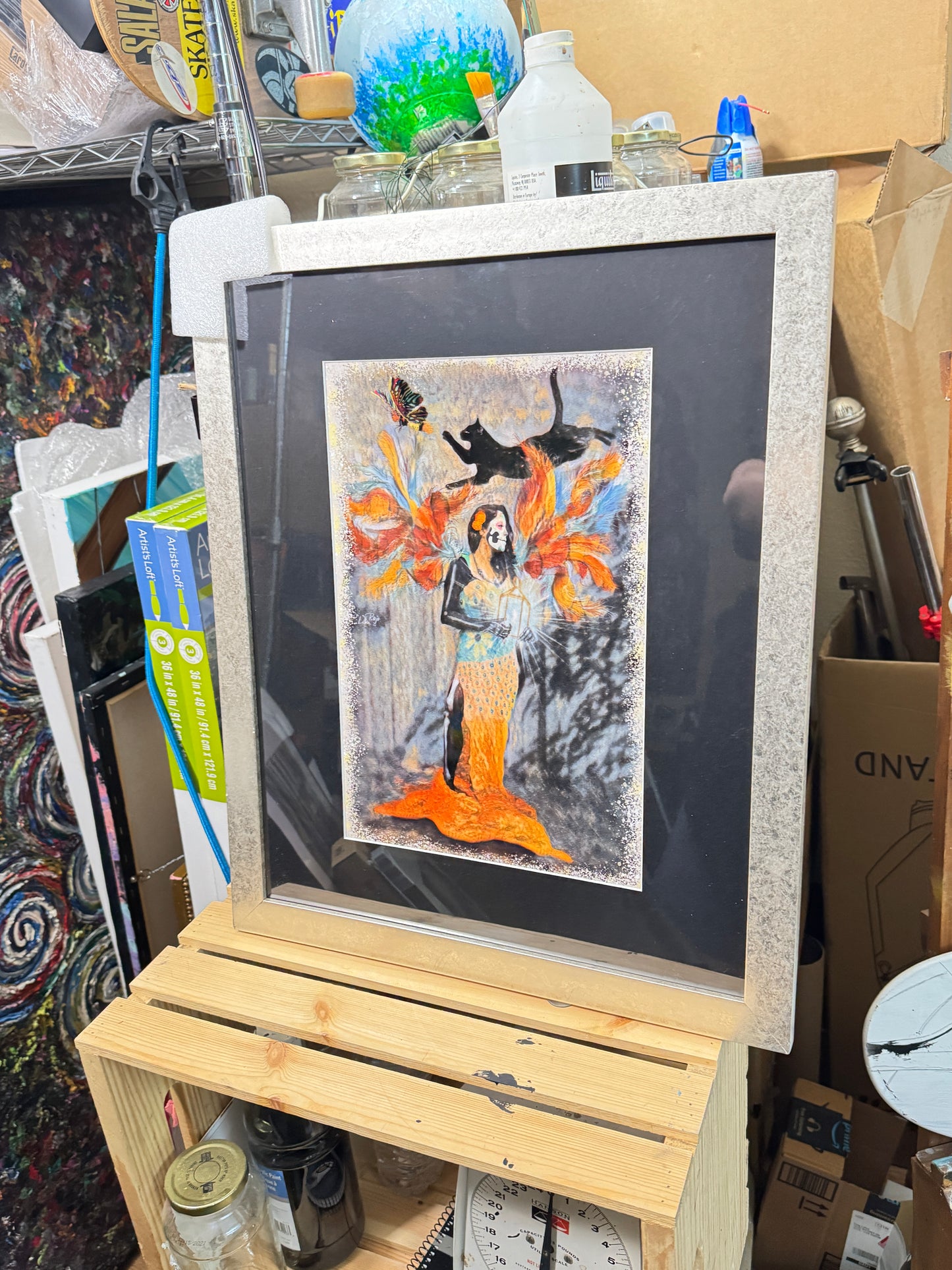 Alma Enjaulada Katrina mixed media art by Doug LaRue 18x22x1 gold metallic frame with a black mat