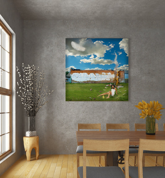 Dining room with a large painting of a woman on grass, a table, chairs, and decorative elements. Angel Falls mixed media art by Doug LaRue