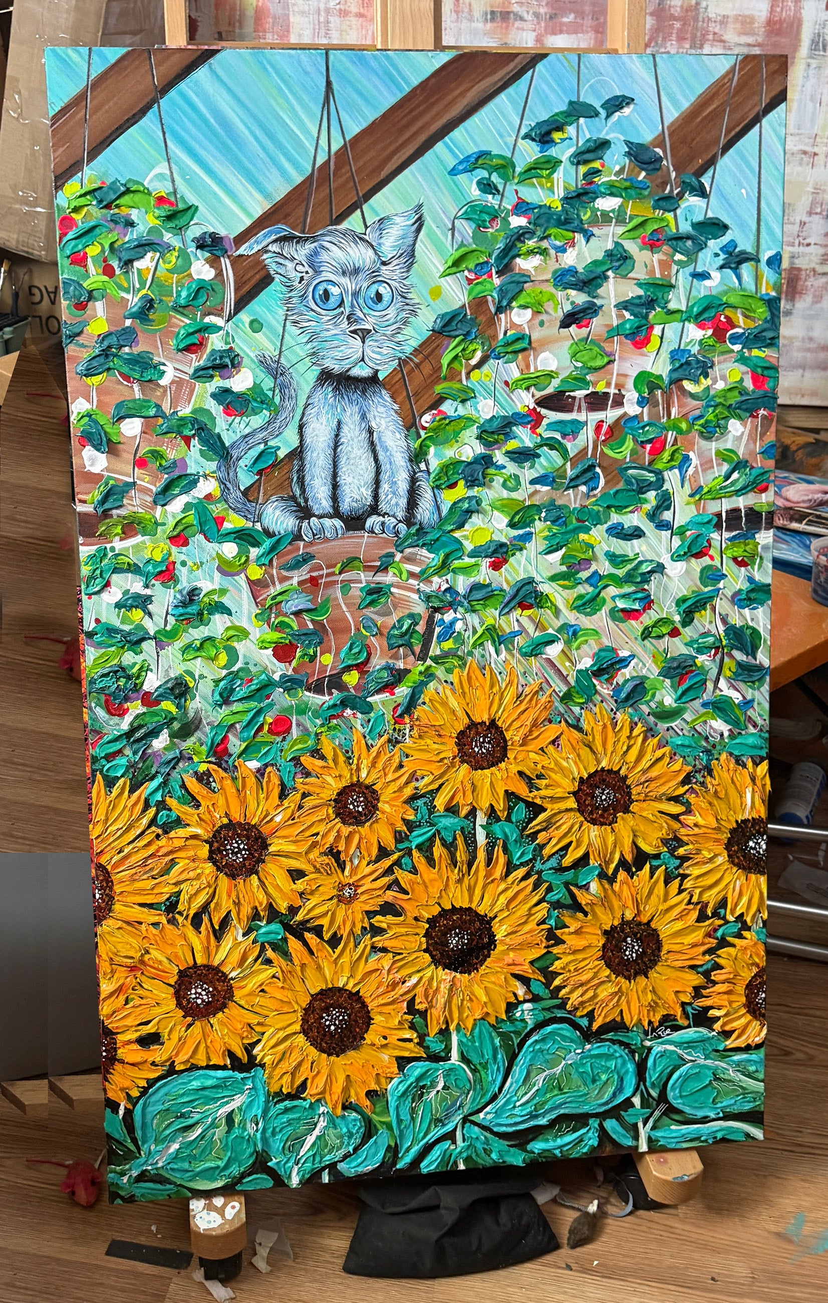 Colorful artwork with a cat and sunflowers on a wooden surface Green House Hang Out by Doug LaRue
