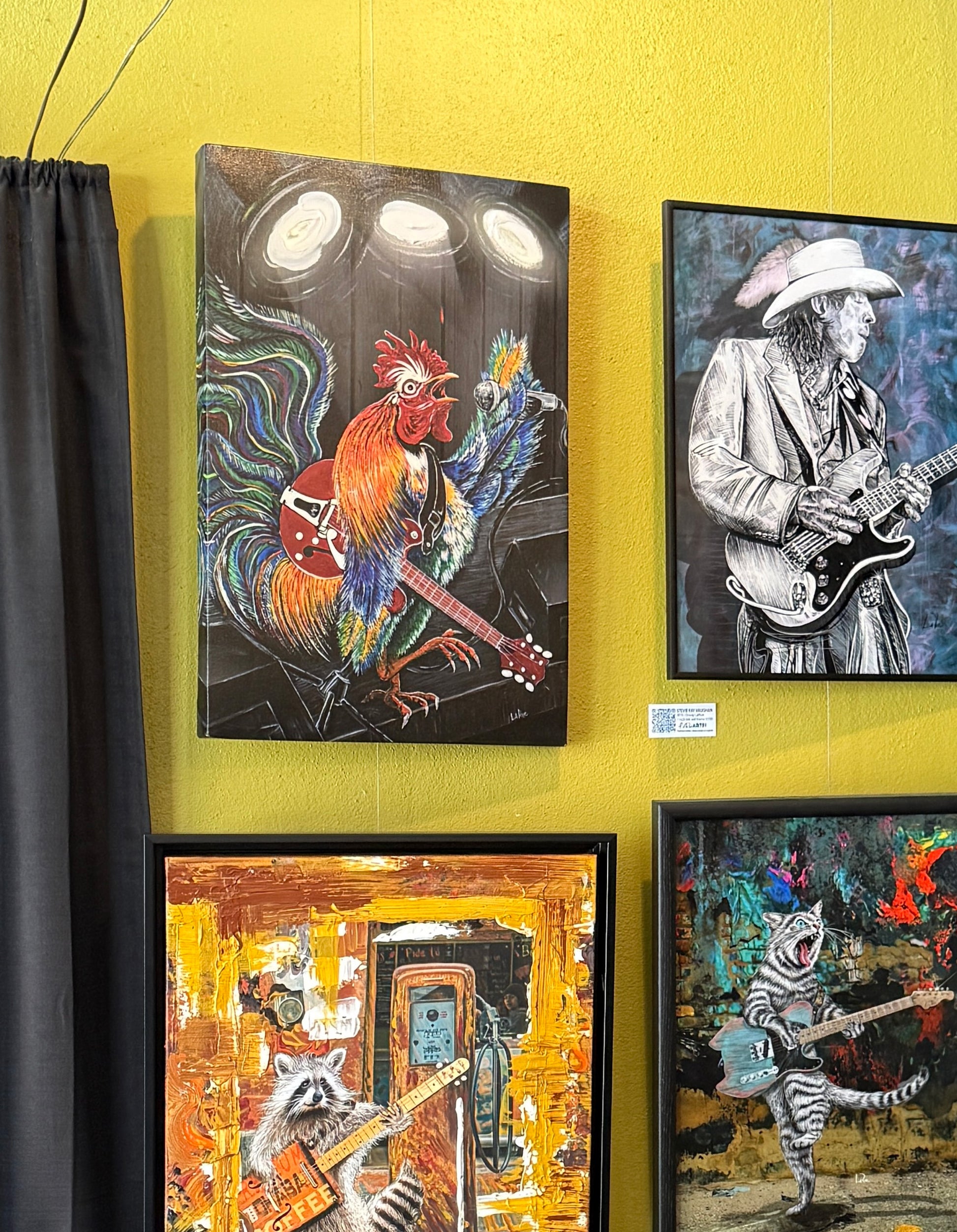 Four colorful paintings on a yellow wall RULING THE ROOSTby Doug LaRue