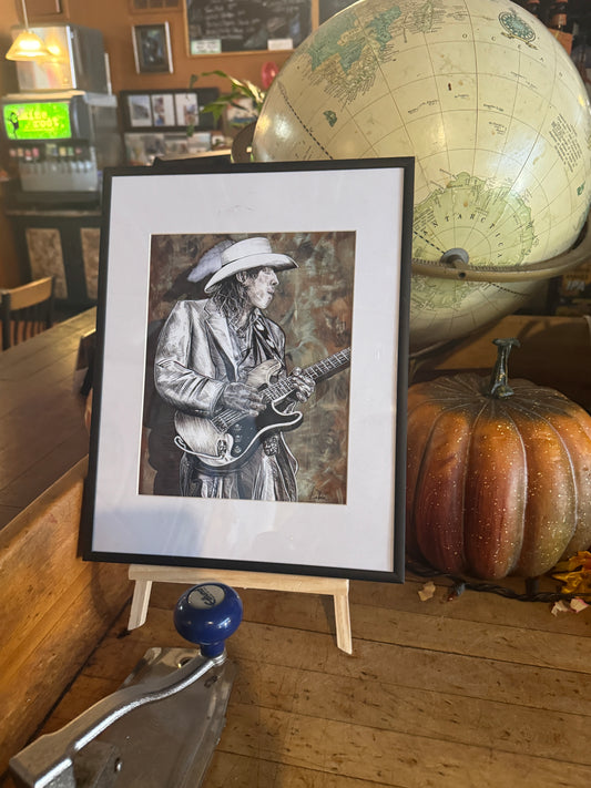 Stevie Ray Vaughan 22 artwork by Doug LaRue in a modern black metal frame @ NeWorld Gallery