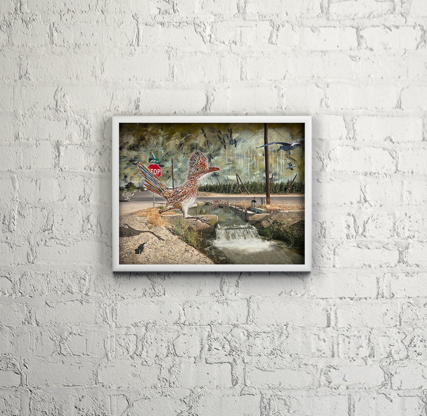 Larue Road Runner mixed media art by Doug LaRue on a white brick wall in a study