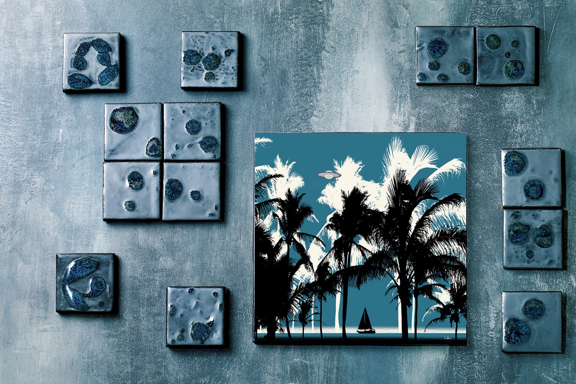 Majestic Beach by Doug LaRue on a gallery wall among smaller square artworks