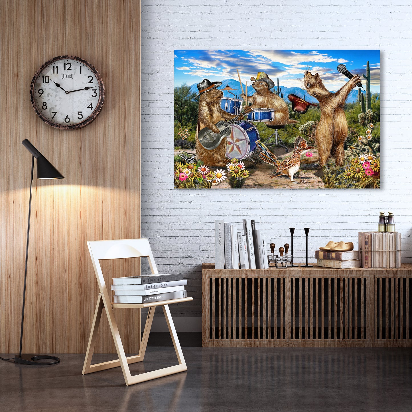 Room interior with a clock on the wall, a chair, and a painting of Prairie Dogs  playing music. The Prairie Dogs live by Doug LaRue