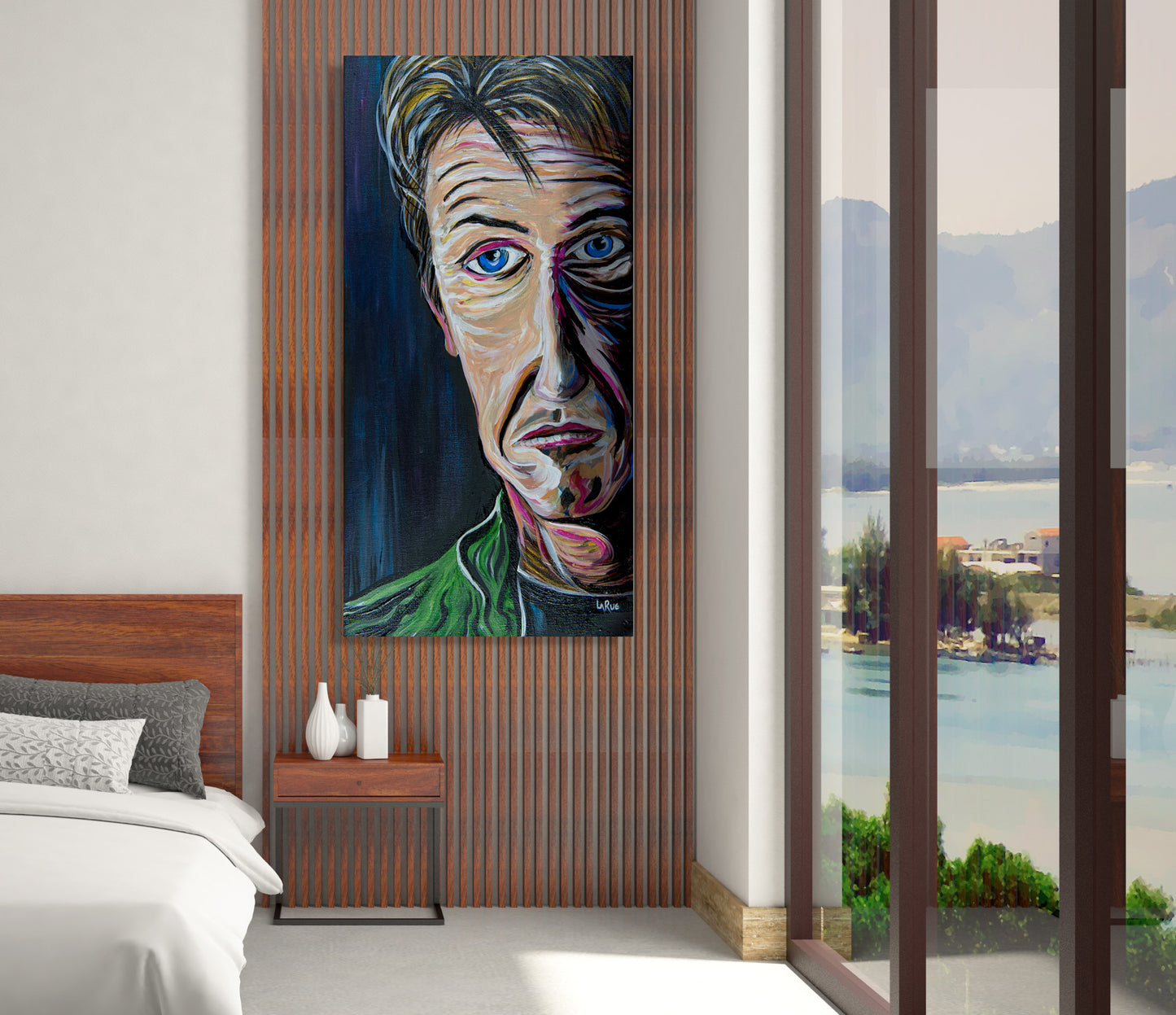 Modern bedroom with a large abstract portrait of Sean Penn Forlorn by Doug LaRue  on the wall, a nightstand with decorative items, and a view of a lake.