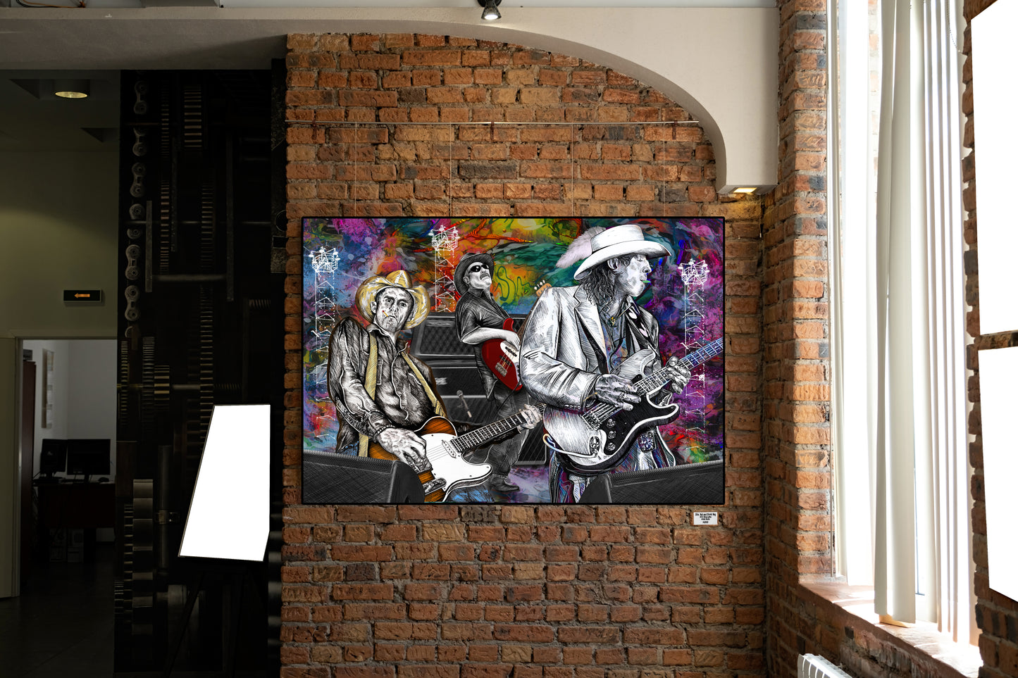 Colorful artwork of musicians on a brick wall. Slim, Red and Stevie Ray by Doug LaRue