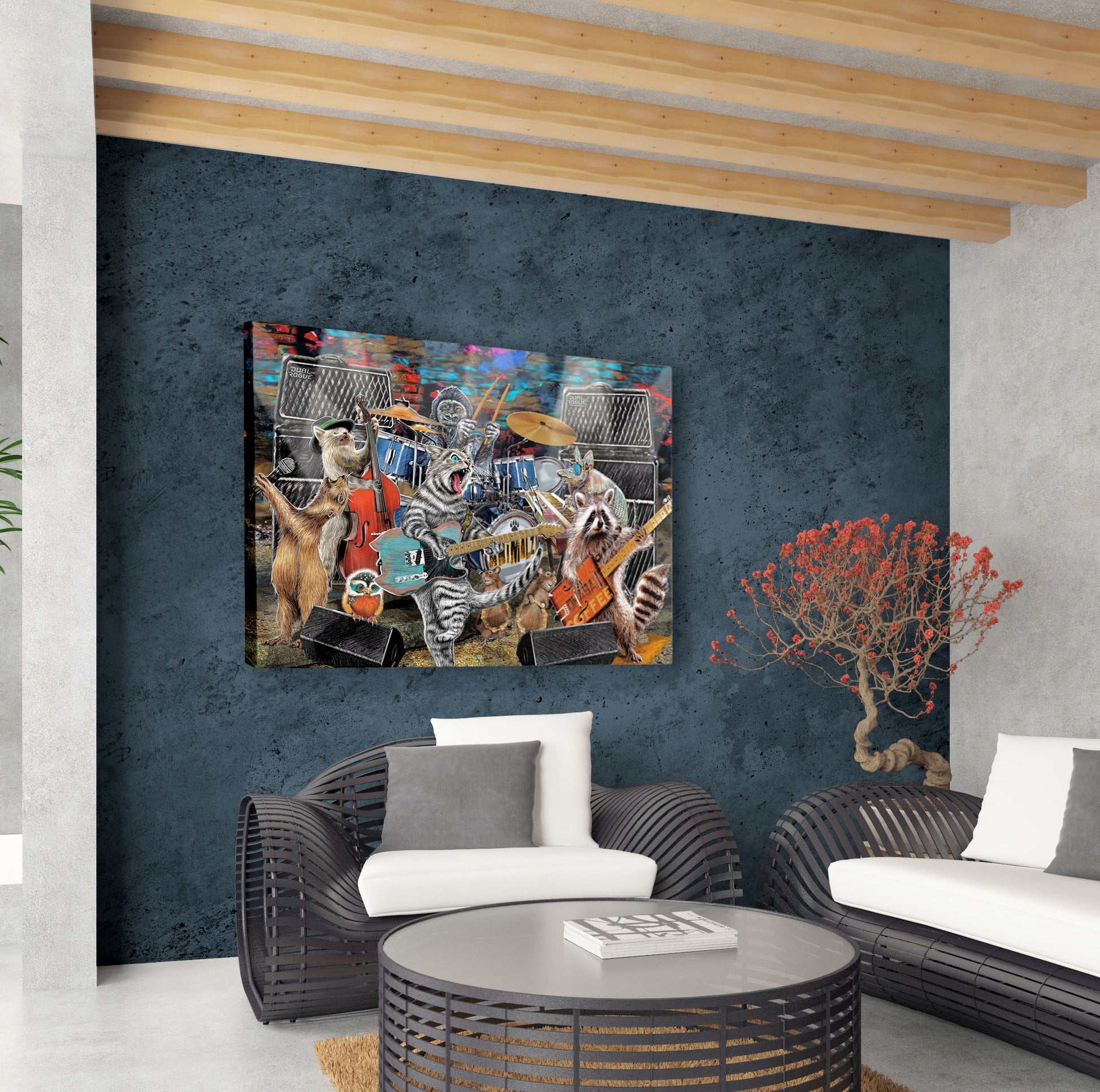 Modern living room with wicker furniture and a colorful painting on the wall. The Animalz Live by Doug LaRue