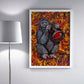 Sports Photographer art by Doug LaRue in a white frame by a lamp