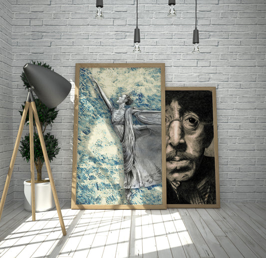 Two framed artworks on a gray brick wall with a lamp and plant in the foreground. Ballerina Waves mixed media by Doug LaRue