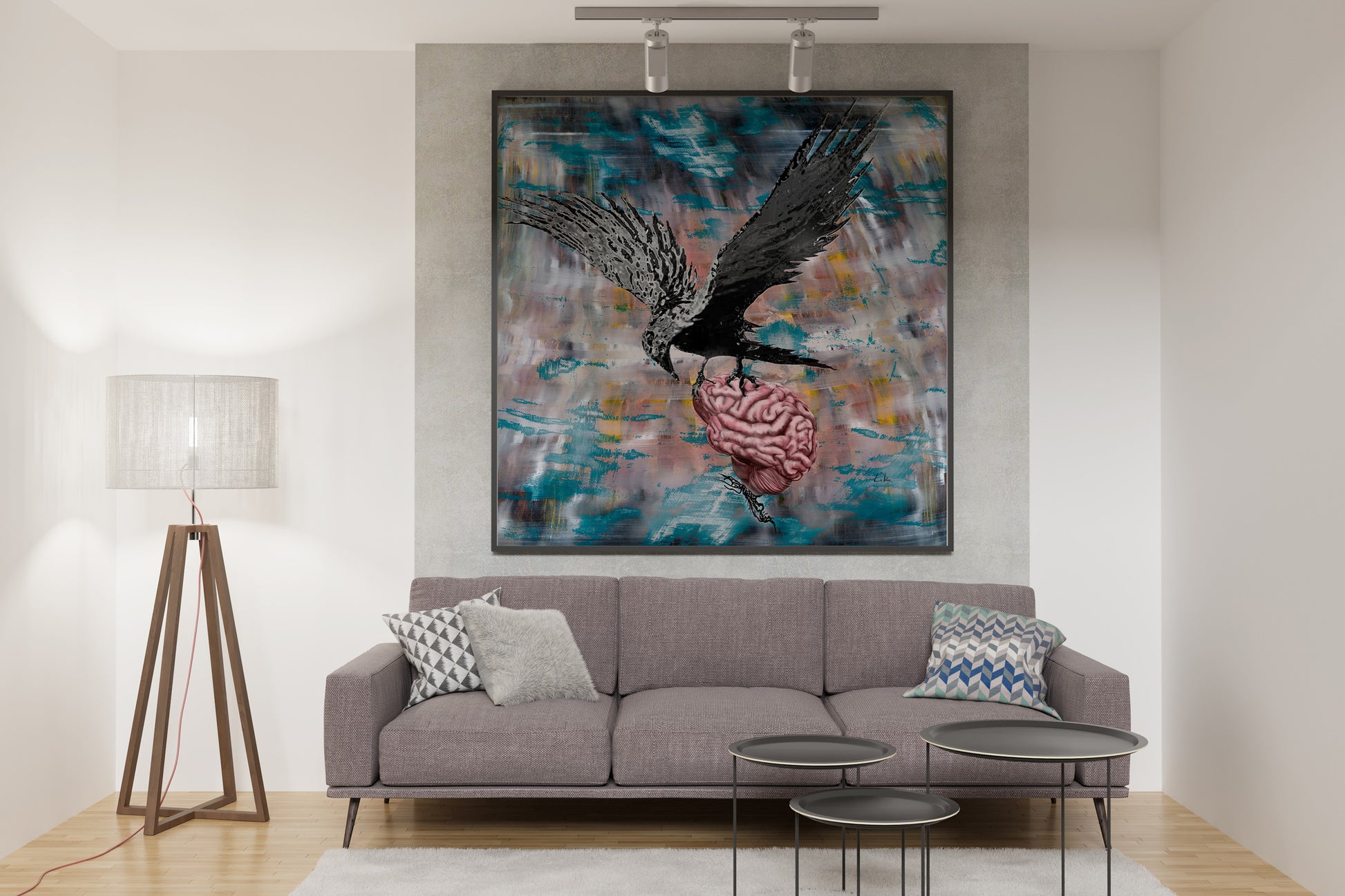 Living room with a gray sofa, abstract painting on the wall called Bird Brain by Doug LaRue, and decorative items. 