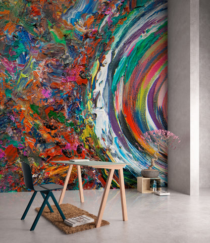 Colorful abstract wall mural in a room with a wooden table and chair. Entanglement by Doug LaRue