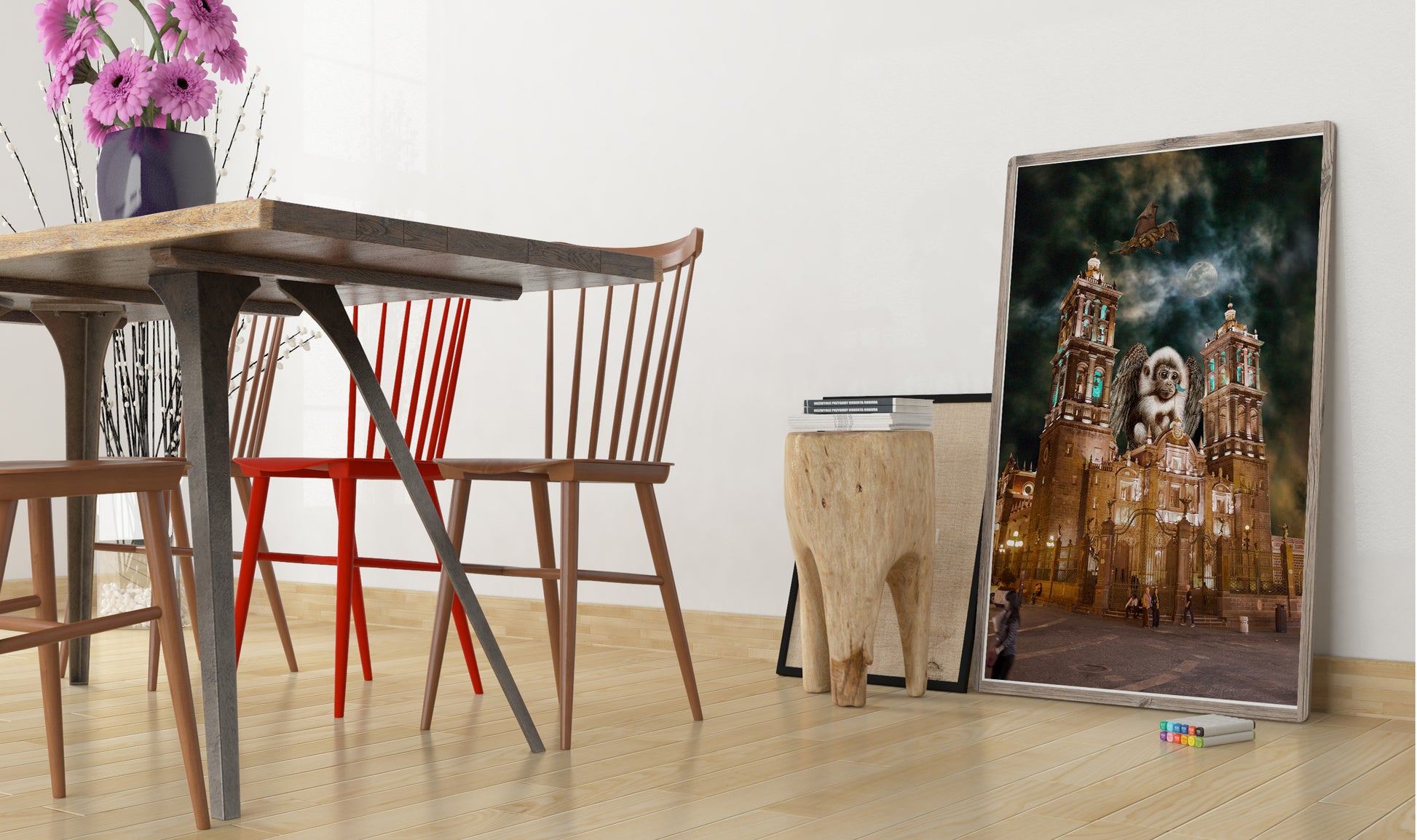 Dining area with wooden table, chairs, and a large framed picture on the wall. Flying Monkeys of Puebla bye Doug LaRue