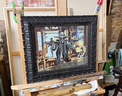 HOMBRE Framed artwork on an easel with a detailed black frame