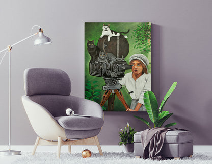 Kat's Camera Crew on a reading room wall between a tan chair and a green plant