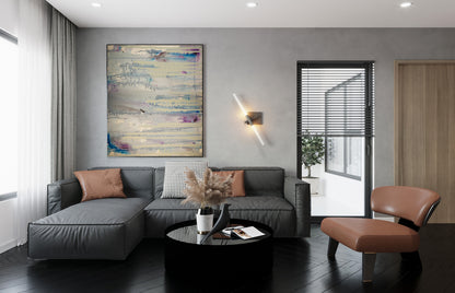 Pale Aquatic 24x20x1.5 in. abstract canvas by Doug LaRue on a wall next to a grey modern sectional couch