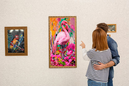 Two people looking at a colorful flamingo painting on a wall.  Pink Flamingo by Doug LaRue