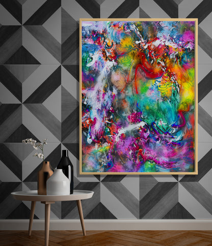 A large framed abstract canvas print with vibrant multicolor brushstrokes hangs on a geometric gray wallpapered wall above a small round side table with decorative vases. Balcones Pop Tart by Doug LaRue