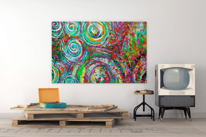 Colorful abstract painting on a wall above a wooden pallet table with a vintage television. Quintescent Drum Kit by Doug LaRue