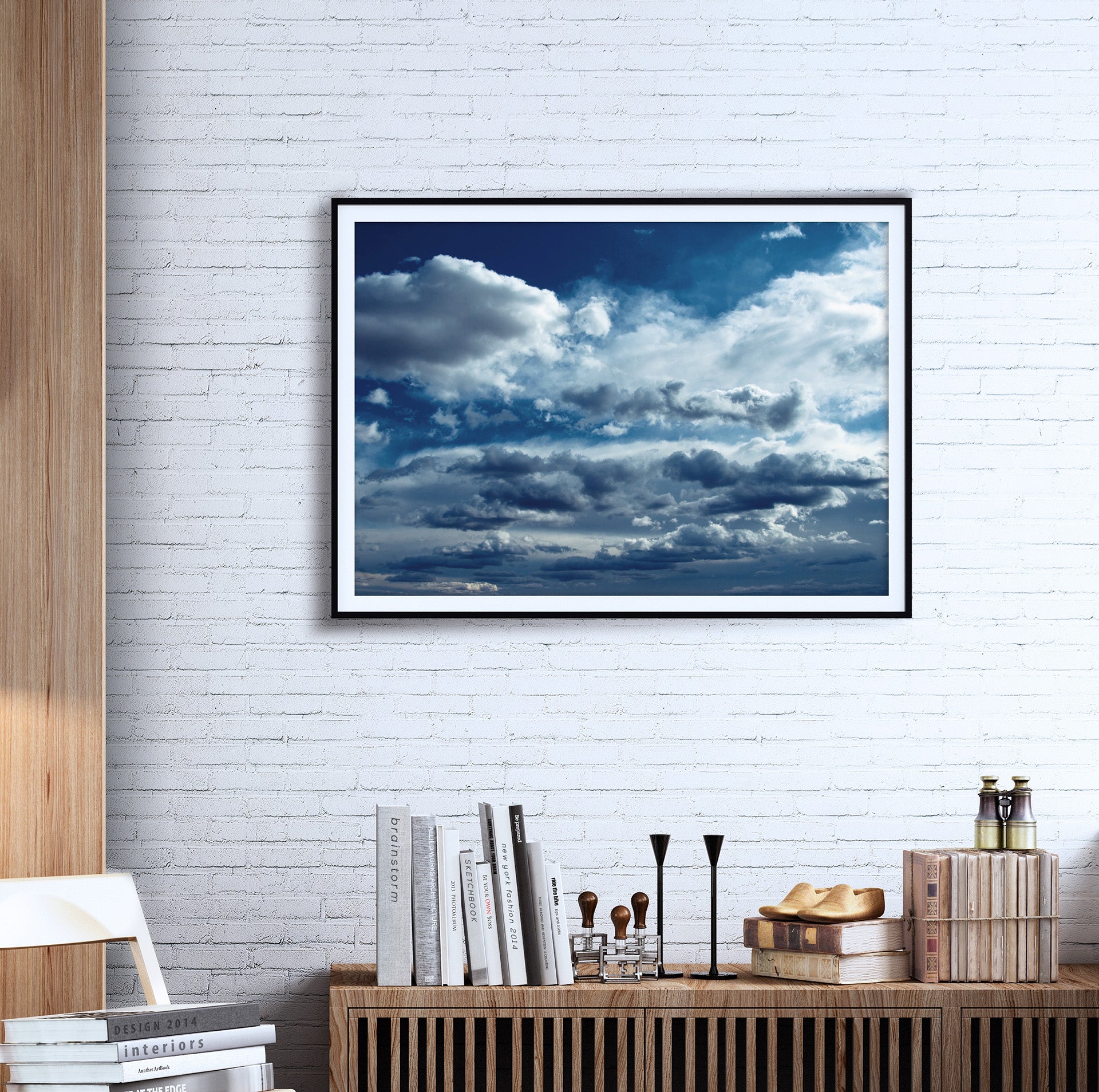 Central Texas Storm Clouds photograph on a white brick wall in a study