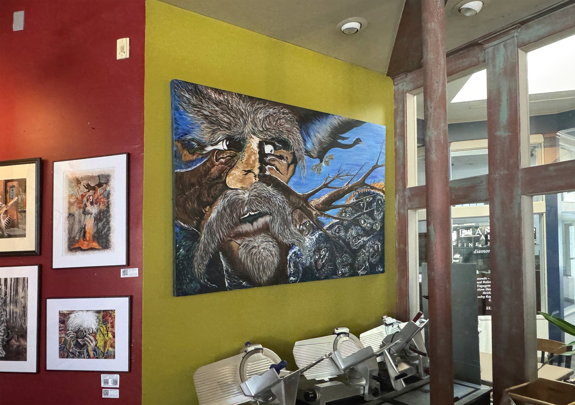 Tree of Life River of Souls painting on the back wall of NeWorlDeli, Austin, Texas