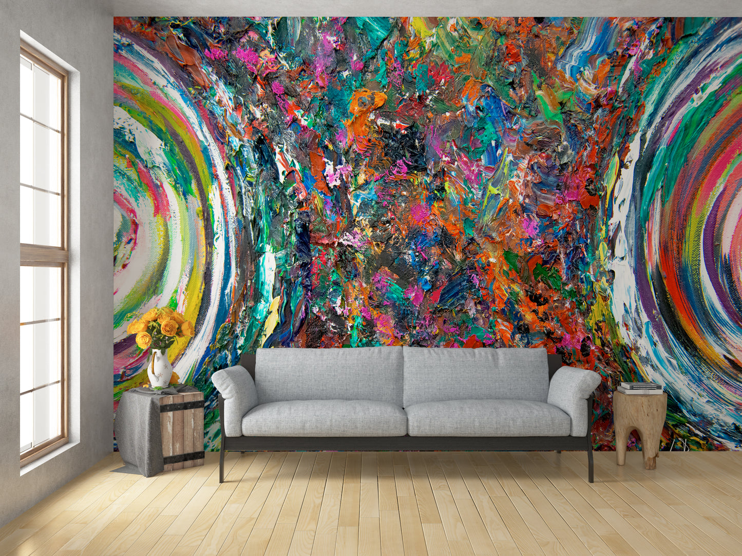 Living room with a colorful abstract wall mural and a gray sofa. Entanglement by Doug LaRue