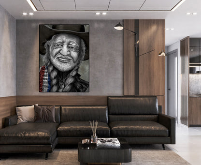 A large black and white portrait canvas print of a bearded man in a hat, displayed on a gray wall above a modern dark leather sectional sofa in a contemporary living room. Willie Nelson by Doug LaRue