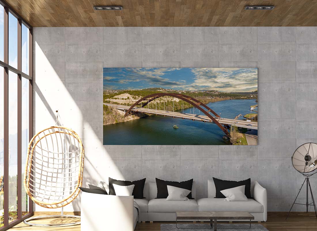 Pennybacker Bridge aerial photograph on a living room wall by Doug LaRue