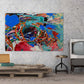 Abstract 21 Boil art by Doug LaRue print on a work room wall near a retro television