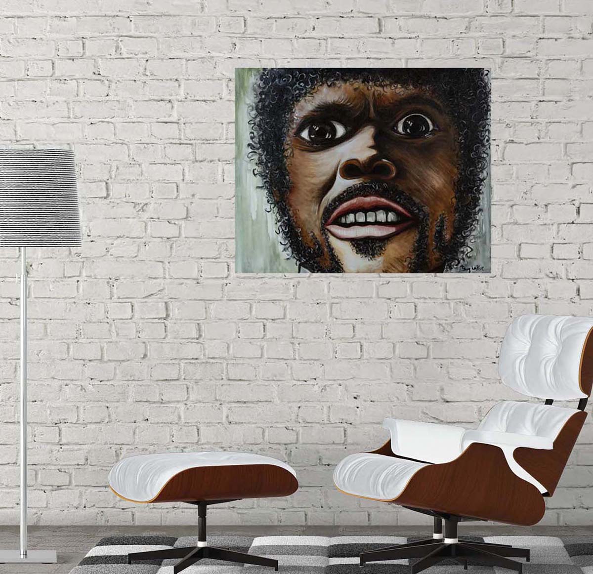 Sam's Furious Anger print on a white brick wall near a lounge chair