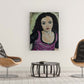 Annie Cabannie Portrait print on a wall by chairs