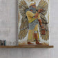 Enki the Annunaki canvas painting by Doug LaRue in a study on a white brick wall.