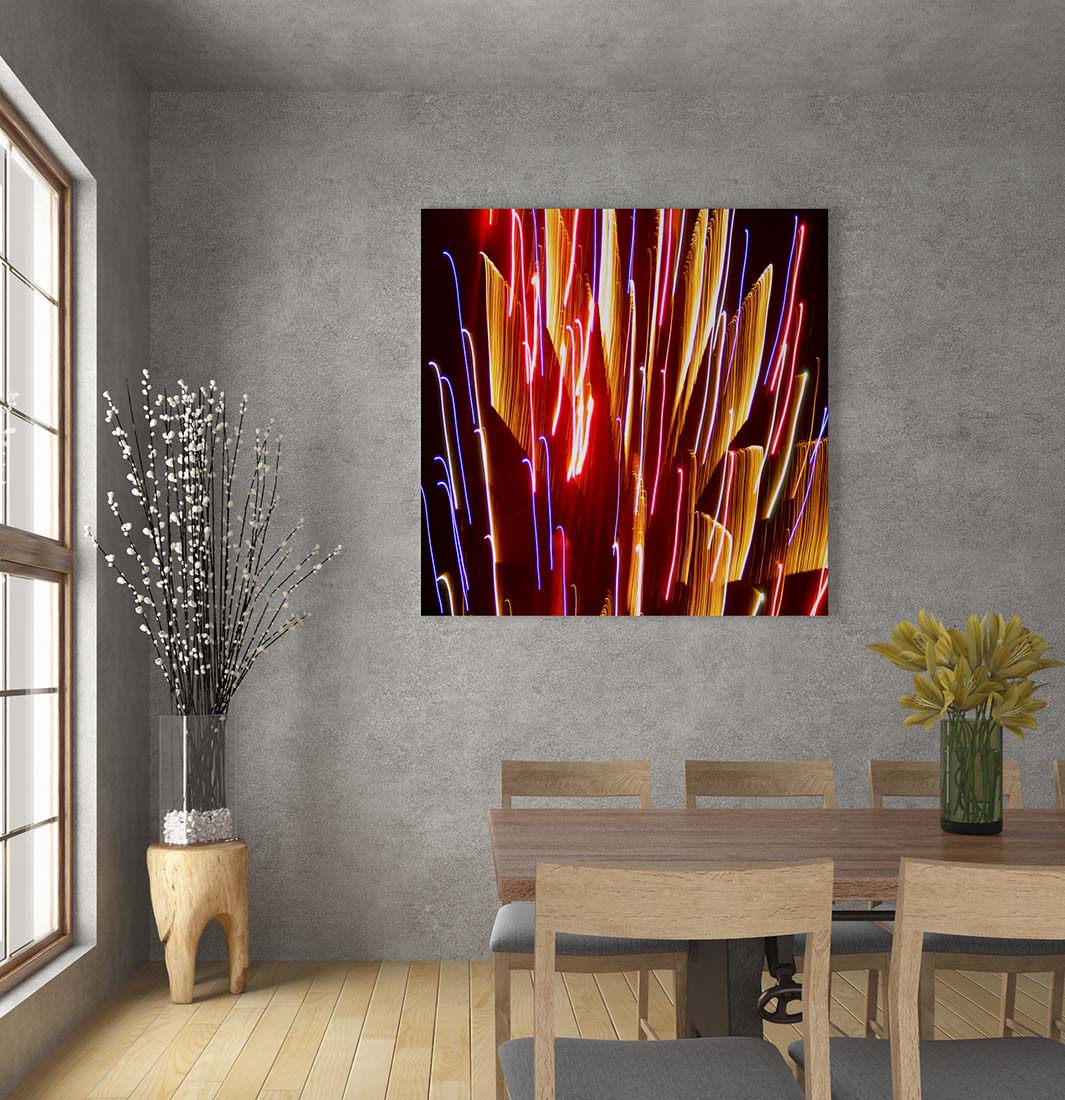 Abstract Fireworks photograph by Doug LaRue large print in a dining room