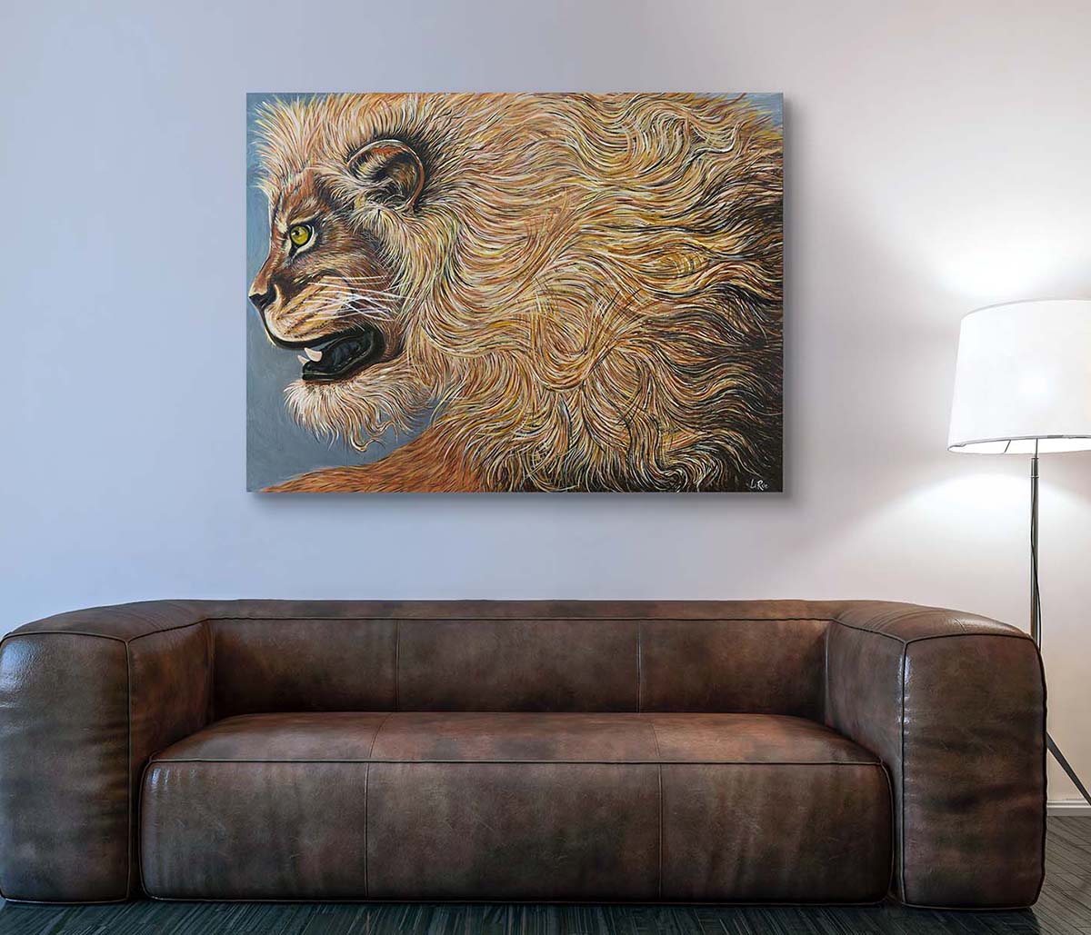 Large art print of Golden Lion painting by Doug LaRue on a wall over a puffy leather couch
