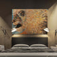 Large art print of Golden Lion painting by Doug LaRue on a wall over a queen size bed