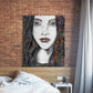 Tara mixed media portrait by Doug LaRue on a red brick wall in a bedroom