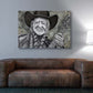 Willie Nelson and Trigger artwork by Doug LaRue on a living room wall over a plush leather couch